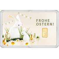 2 weiße Häschen sitzen auf der linken Seite der Geschenkkarte. Auf der rechten Seite ist der 0,5g Goldbarren unter der Aufschrift "Frohe Ostern" zu sehen.