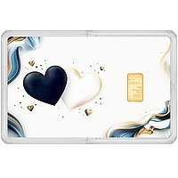 The gift card shows a black and white heart on the left-hand side. The gold bar is attached to the right-hand side.